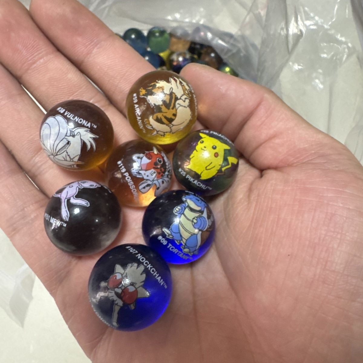 Mercancía oficial de Pokémon a - Vintage Collectible Marbles reseña y precio